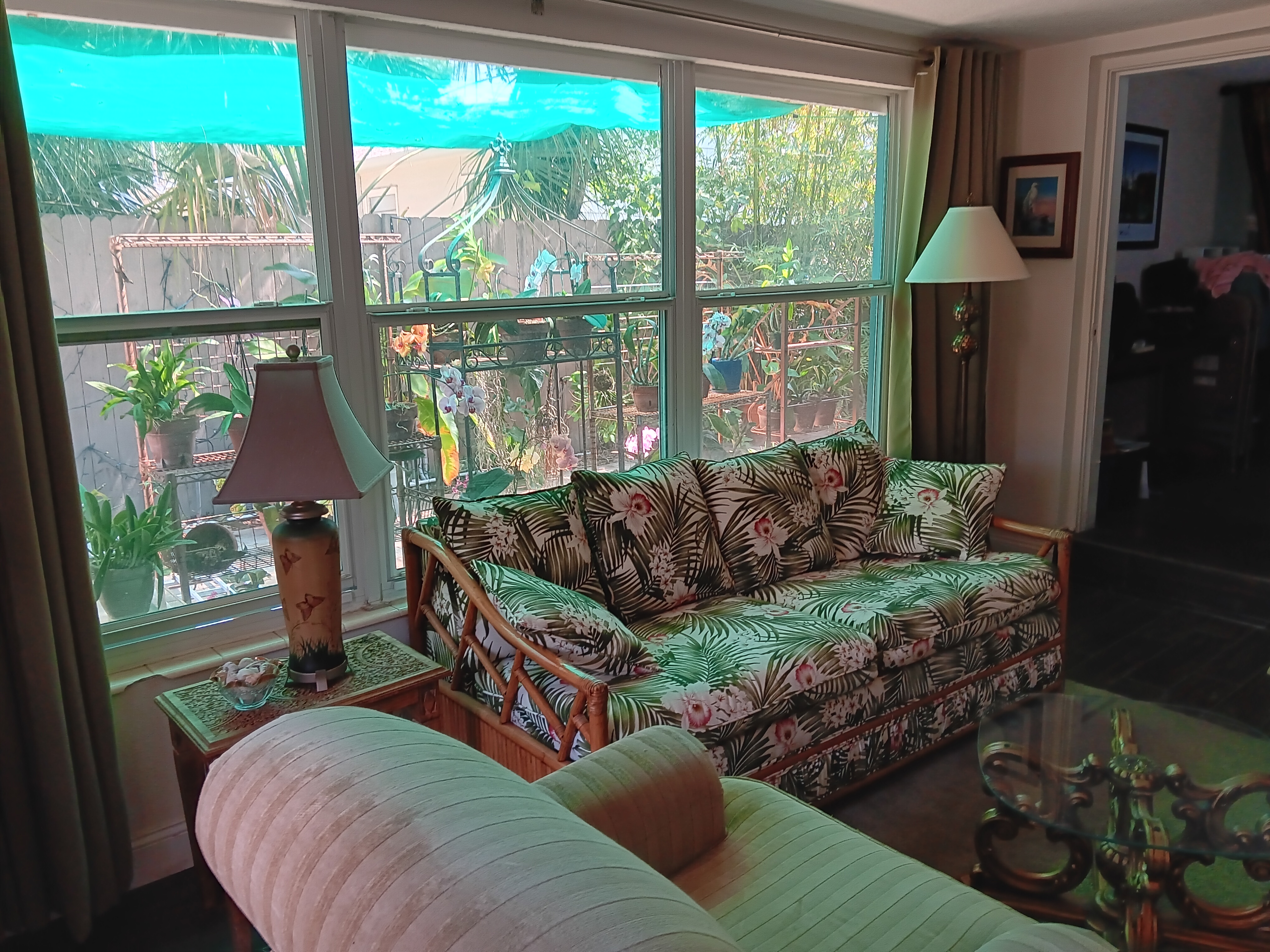 The livingroom picture windows look out on the patio